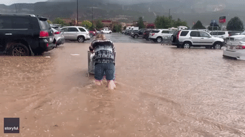 Walmart Parking Lot Submerged as Flash Flooding Hits Cedar City, Utah