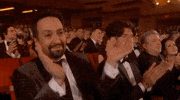 Celebrity gif. In the audience at the Tony Awards, Lin Manuel Miranda applauds enthusiastically and says, “that’s right.”