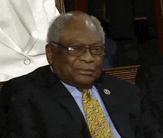 Political gif. Jim Clyburn is at the 2020 State of the Union address and he's sitting in the audience. He looks down and shakes his head solemnly, disagreeing with whatever the speaker is saying.