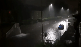 Local Surprised as Edinburgh Downpour Leaves Street With 'a Lake and Waterfall'