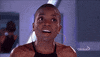 Reality TV gif. Contestant on Big Brother gasps with shock and puts her hands up to her head.
