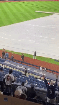 Cleveland Guardians Star Myles Straw Tosses Football With Yankees Fans During Rain Delay