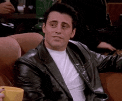 Friends gif. Matt LeBlanc as Joey nods and smiles as he looks wide-eyed and says, sarcastically, "Wow."