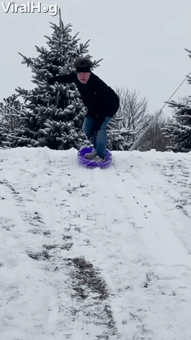 Man’s Sledding Stunt Ends in a Snowy Roll