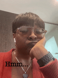 thepeoplescheerleader look glasses looking hmm GIF