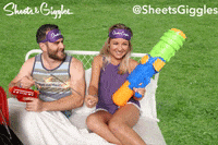 SheetsGiggles party fire water light GIF