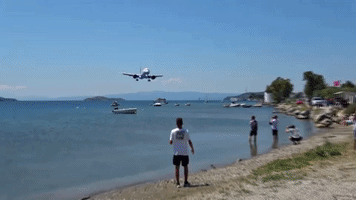 Jet Lands Dangerously Close to 'Planespotters' 