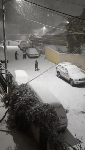 Children Rejoice in Jordan as Winter Storm Brings Snow to Middle East