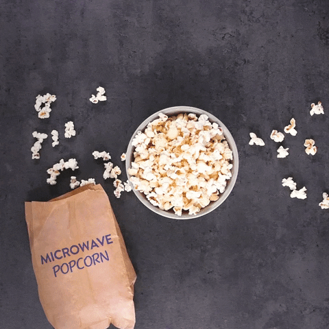 PopcornCentral giphyupload yummy snack popcorn GIF
