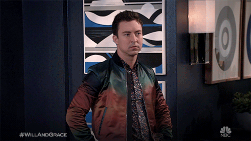 Nbc Shrug GIF by Will & Grace