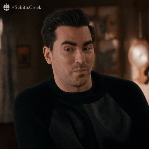 Schitt's Creek gif. Dan Levy as David shakes his head in disappointment and says "I wish I was joking."