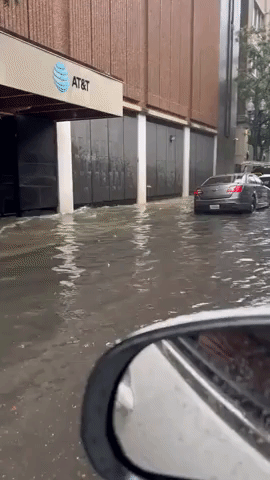 Motorists Drive Through New Orleans Floodwaters