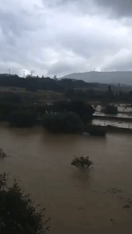 Car Seen Submerged as Heavy Rain Causes Flash Flooding in Crete