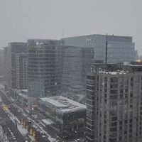Snow Falls in Boston's Seaport Neighborhood Amid Weather Warnings