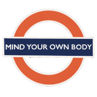 Digital art gif. In the style of the British "mind the gap" sign is a red circle overlaid with a blue rectangle, inside of which text reads, "mind your own body." The sign tilts back and forth.