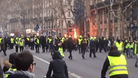 Demonstrators Set Barricades on Fire on Boulevard Saint Germain