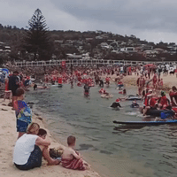 Santas Take to Surf For Annual Christmas Event in Australia