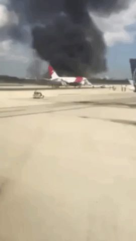 Engine Fire Forces Plane's Evacuation