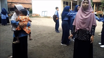 Children Evacuate School Building After Earthquake Shakes Lombok, Indonesia