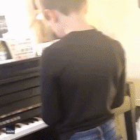 Father and Son Play Beethoven-Inspired Piano Duet on Christmas Day