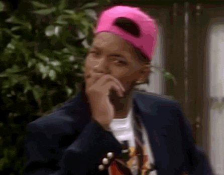 TV gif. Will Smith as Will from The Fresh Prince of Bel-Air, looks at us with his hand over his mouth, looking skeptical or suspicious.. 