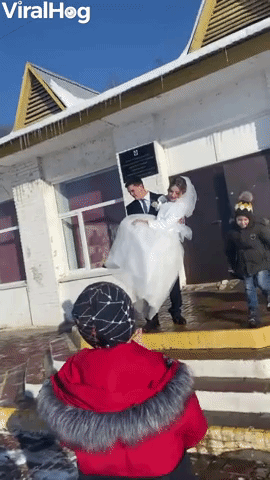 Slippery Steps Send Bride and Groom to the Ground