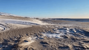 Winter Storm Covers Long Island Beach in Snow