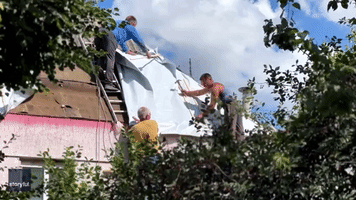 Locals Near Kharkiv Assess Damage After Deadly Shelling