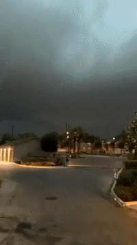 Dark Clouds Loom as Lightning Flashes Over San Antonio, Texas