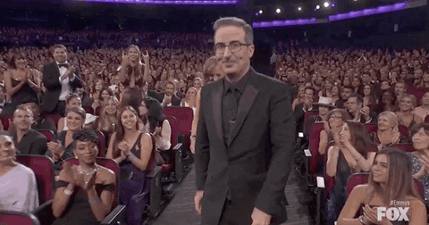 John Oliver Smile GIF by Emmys