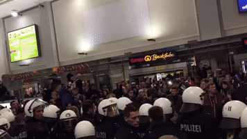Anti and Pro-Refugee Protesters Face Off at Dortmund Train Station