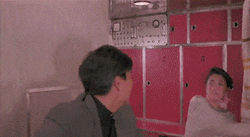 brattle giphyupload 1986 michelle yeoh in the line of duty GIF