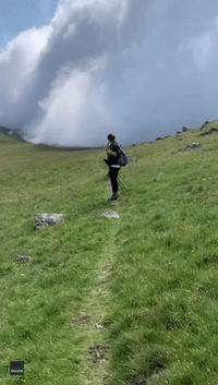 'Jeez': Woman Captures Stunning Cloud Rolling Across Hilltop in Northwest England