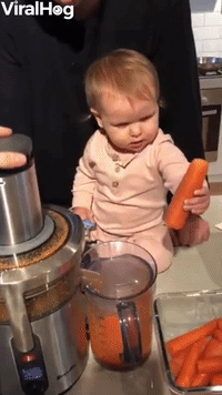 Baby Adds Special Secret Ingredient to Carrot Juic