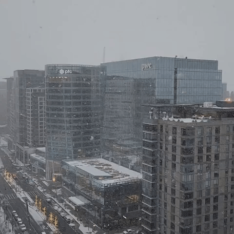 Snow Falls in Boston's Seaport Neighborhood Amid Weather Warnings