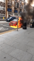 Bystanders Attempt to Stop Rolling, Flaming Car in Walthamstow, London