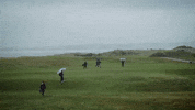 Golfing Rainy Day GIF by Northwestern Athletics