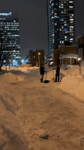 Toronto Neighborhood Digs Out After Winter Storm Hits Ontario