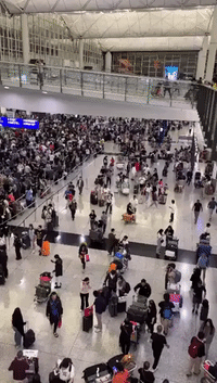 'Chaotic Scenes' as Storm Koinu Shuts Down Rail Link at Hong Kong Airport