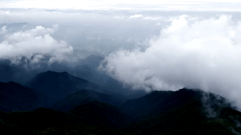 clouds mountains GIF by Joanie Lemercier