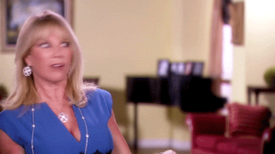 real housewives shrug GIF by RealityTVGIFs