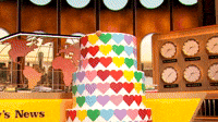 Drew popping out of a cake