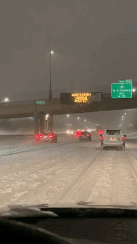 Motorists Drive With Caution as Snow Storm Hits Minneapolis Highway