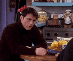 Friends gif. Matt LeBlanc as Joey sitting at a table saying, "Monday, one day. Tuesday two day. Wednesday, When? Huh? What day? Thursday!