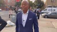 Eric Adams Walks NYC Streets With Mother's Photo on Election Day
