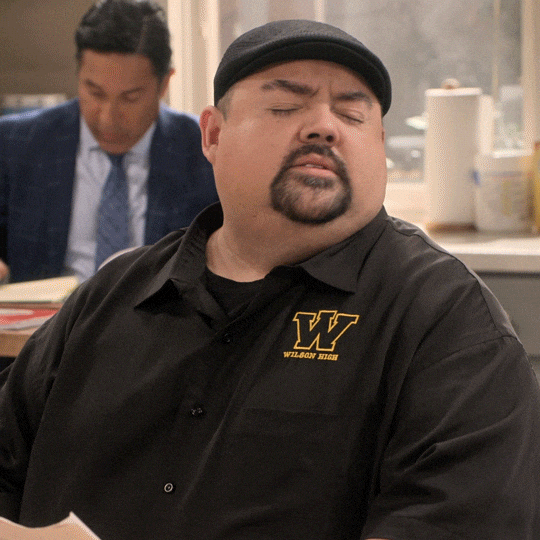 TV gif Wearing a black polo shirt and a black Kangol hat Gabriel Iglesias from Mr Iglesias shakes his head quickly as if throwing a tantrum Text I dont wanna