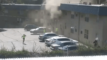 Construction Workers Catch Children Escaping Fire Through Window in Albuquerque
