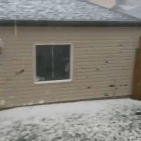 Hail Punches Holes in Siding of Homes in Calgary