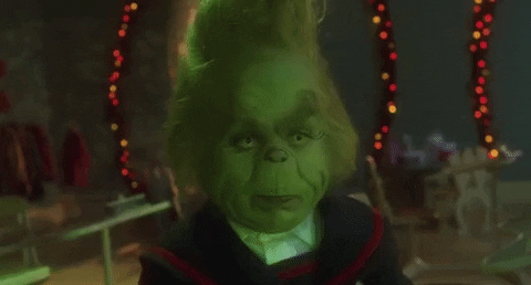 Movie gif. John Ryan Evans as Young Grinch in How The Grinch Stole Christmas rolls his eyes while he’s at school. 