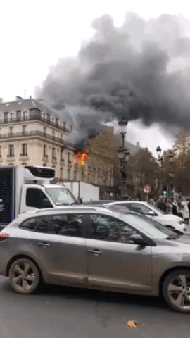 Flames Burst Through Windows as Large Fire Seen in Central Paris